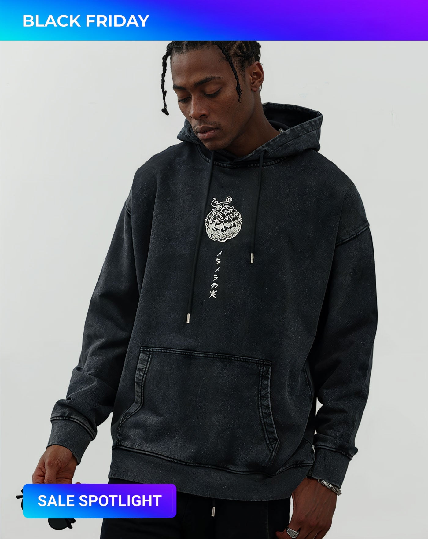 Man wearing a black vintage washed anime-inspired streetwear hoodie featuring a small front white graphic print, relaxed oversized fit from Torazen’s Whitebeard Legacy Hoodie.