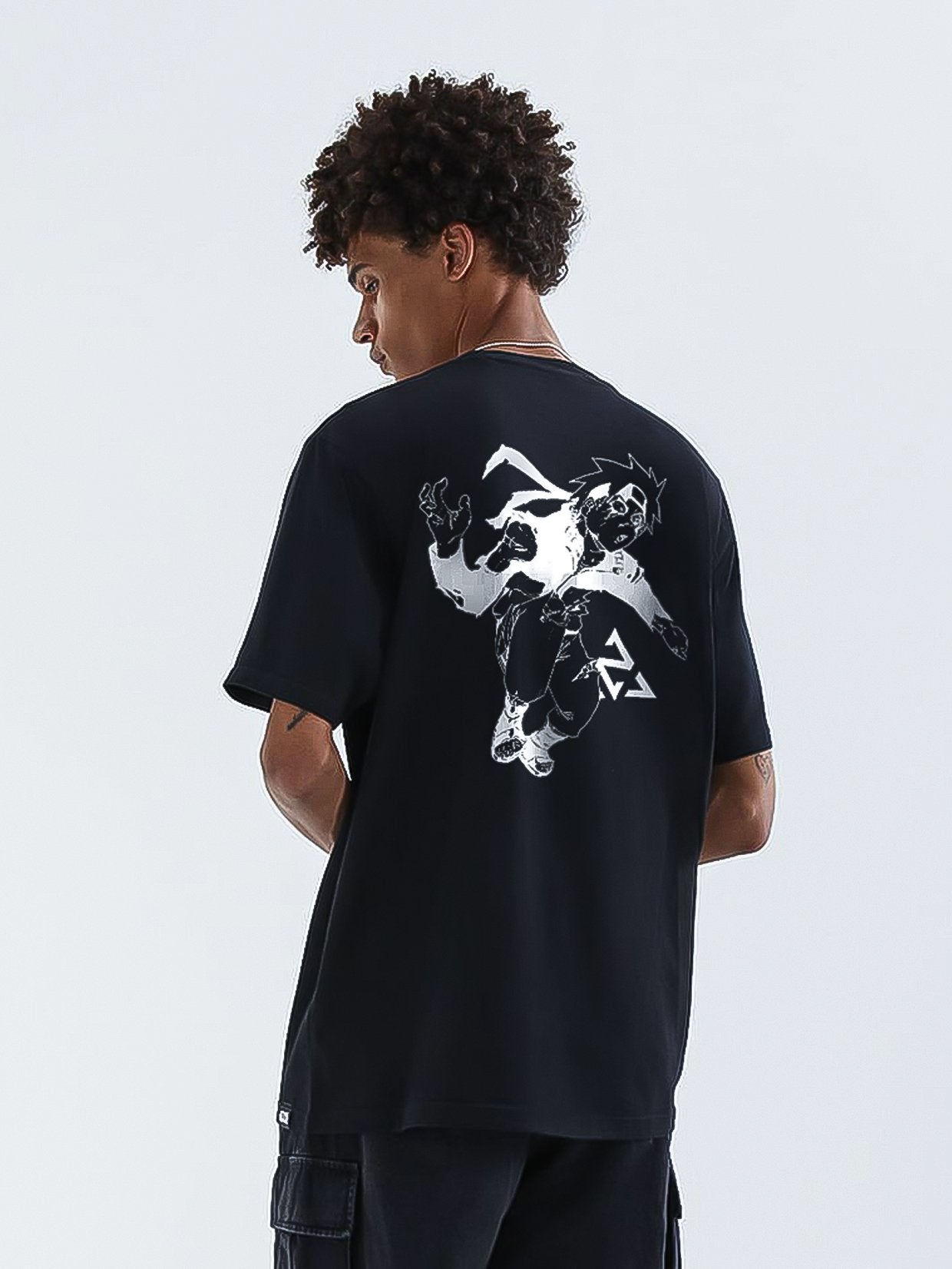 A t-shirt with anime-inspired design, blending manga shonen style with modern streetwear aesthetic.
