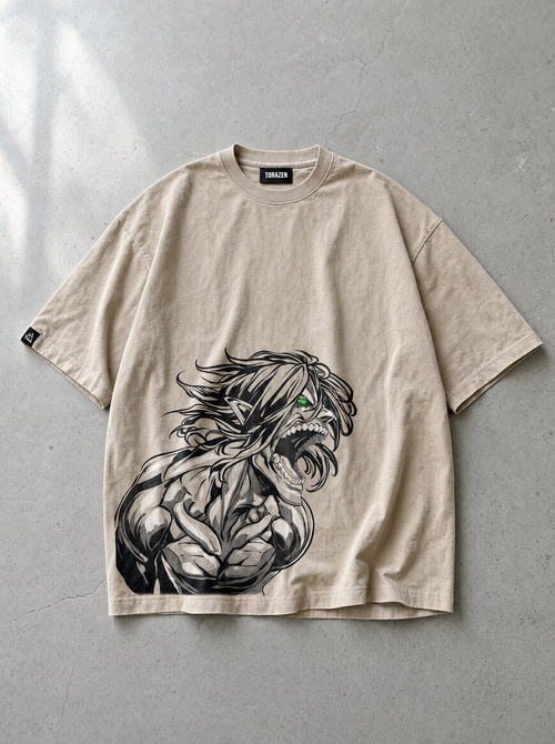 Flat lay of AOT ✦ Attack Titan Green Eye Vintage Tee on concrete