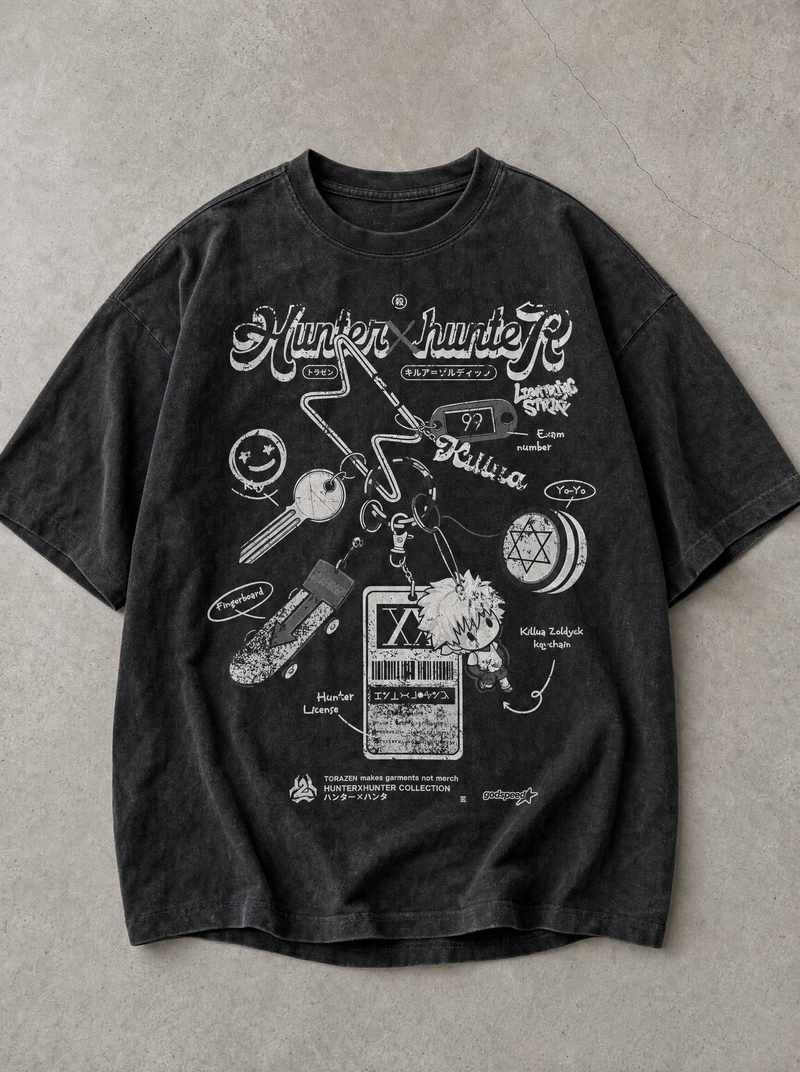 Assassin's Keyring Vintage Tee - front flat lay on concrete, vintage-washed vintage tee