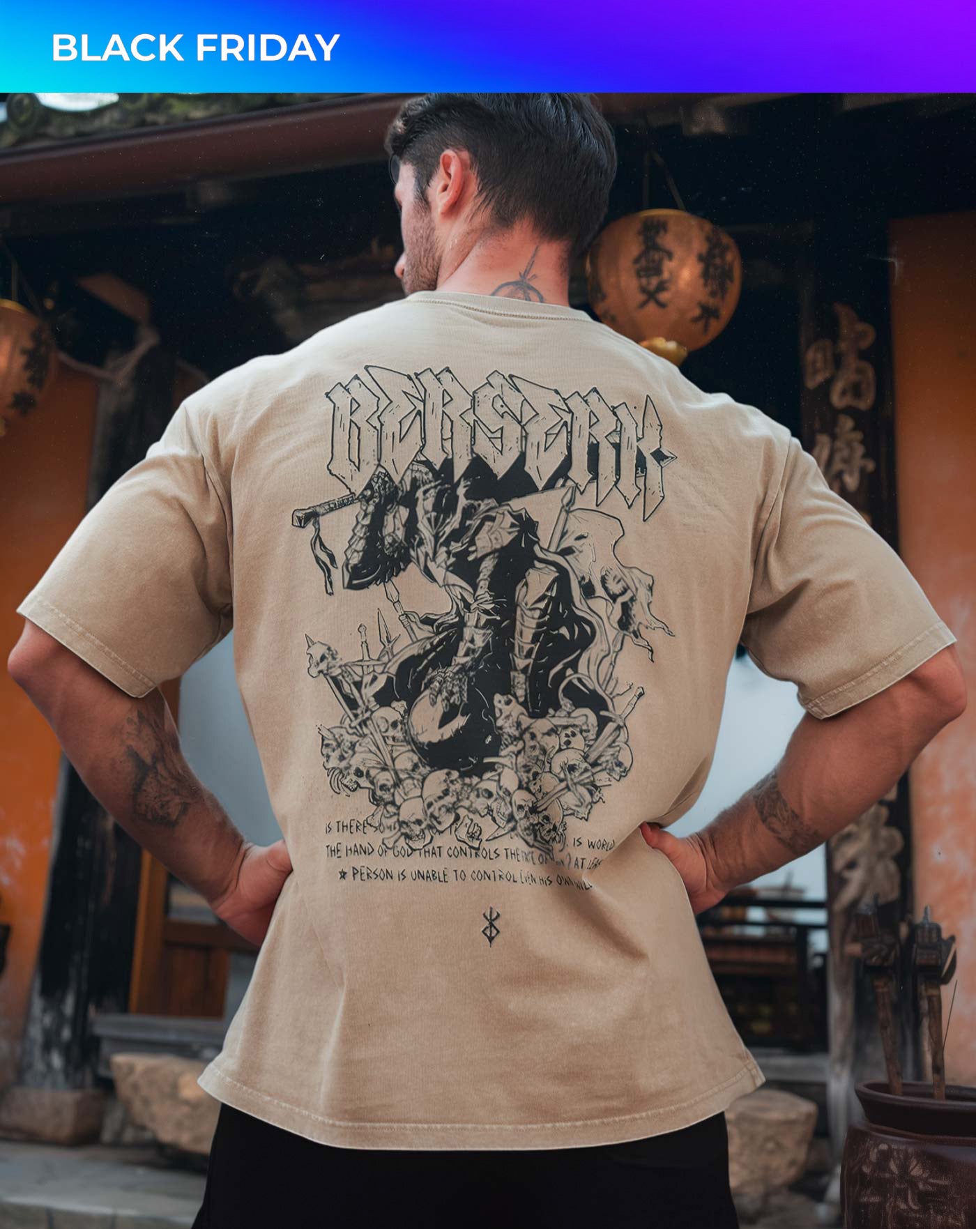 Man wearing a beige vintage washed anime-inspired streetwear t-shirt featuring a detailed warrior and skull back graphic, relaxed oversized fit from Torazen’s Berserk Mode tee.