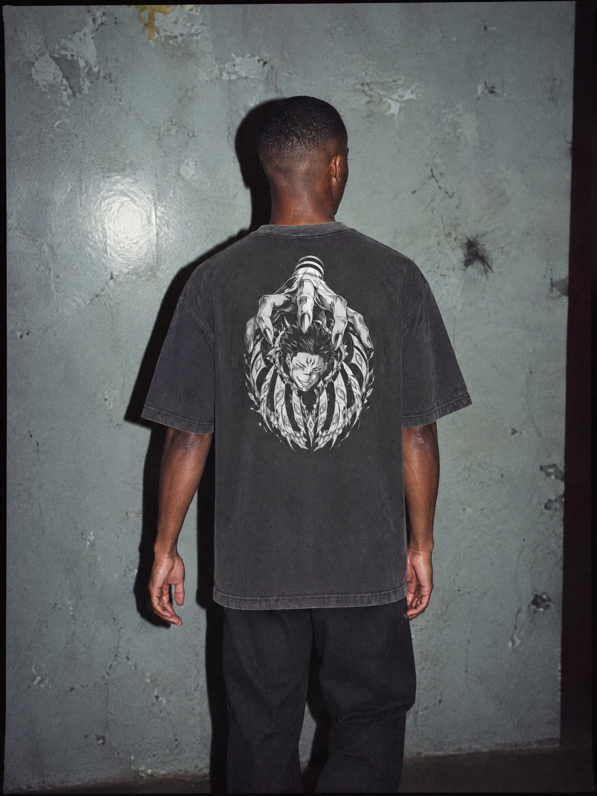 JJK ✦ Cursed Grip Vintage Tee by Torazen, worn on model